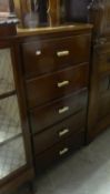 A MAHOGANY FINISH TALL PEDESTAL OF FIVE DRAWERS AND A SHALLOW TWO DOOR STORAGE CABINET (2)