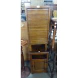 CIRCA 1920’S OAK BEDSIDE/STORAGE CUPBOARD WITH SHUTTER FALL-FRONT AND A CARVED OAK BEDSIDE