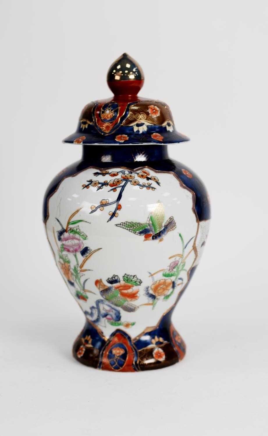 MODERN ORIENTAL PORCELAIN VASE AND COVER, of ovoid form with pointed finial to the domed cover,