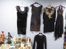 FIVE LADY’S BLACK FABRIC EVENING DRESSES, three decorated with sequins, another with beadwork to the