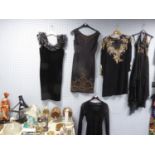 FIVE LADY’S BLACK FABRIC EVENING DRESSES, three decorated with sequins, another with beadwork to the