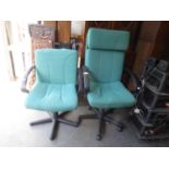 EXECUTIVE’S REVOLVING OFFICE ARMCHAIR, IN GREEN FABRIC ON BLACK FIVE SPUR BASE WITH CASTORS AND A