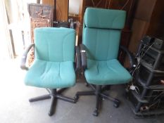 EXECUTIVE’S REVOLVING OFFICE ARMCHAIR, IN GREEN FABRIC ON BLACK FIVE SPUR BASE WITH CASTORS AND A