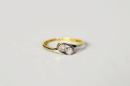 18ct GOLD PLATINUM CROSSOVER RING with two tiny diamonds in deceptive settings, 1.2gms, ring size