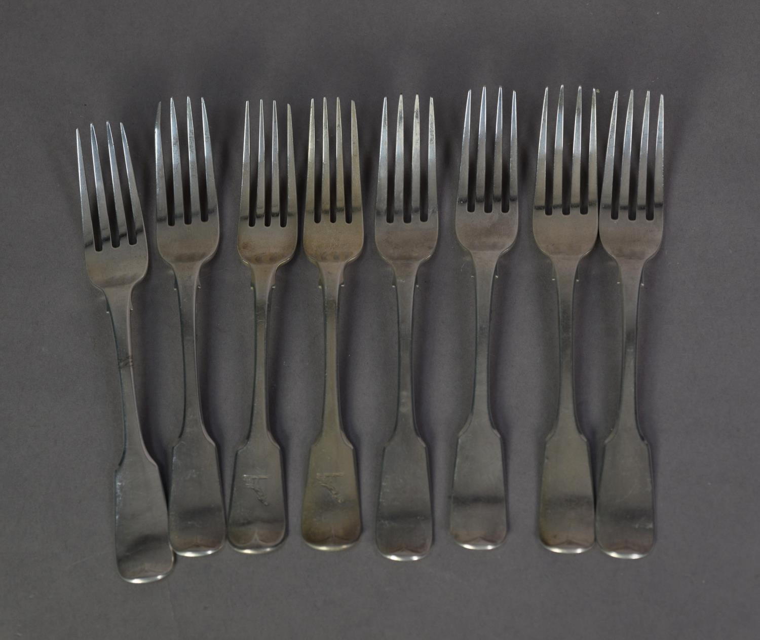 MATCHED SET OF EIGHT LATE GEORGE III SILVER FIDDLE PATTERN CRESTED TABLE FORKS, London 1819, 18 oz