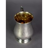 MID-VICTORIAN SILVER BALUSTER SHAPE MUG with gilded interior and leaf-capped scroll handle, later