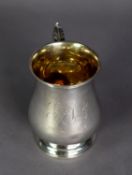 MID-VICTORIAN SILVER BALUSTER SHAPE MUG with gilded interior and leaf-capped scroll handle, later