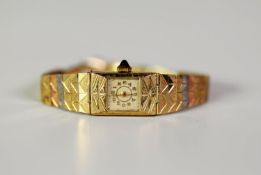 LADY'S 14K GOLD BRACELET WATCH, with mechanical movement, small square silvered dial with gold