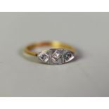 18ct GOLD AND PLATINUM RING with lozenge shaped top set with three tiny white stones, ring size M