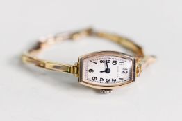 LADY'S ROLCO SWISS 9ct GOLD WRISTWATCH with 15 rubies movement, small rounded oblong arabic dial,