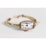 LADY'S ROLCO SWISS 9ct GOLD WRISTWATCH with 15 rubies movement, small rounded oblong arabic dial,