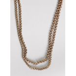 LONG, ROLLED GOLD CONTINUOUS GUARD CHAIN, with belcher pattern links, approximately 62in (158cm)