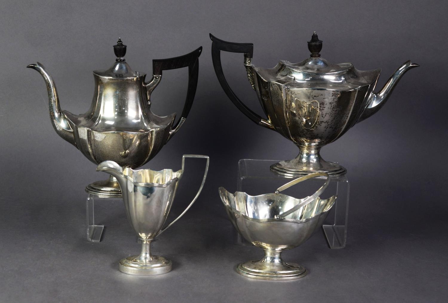 GEORGE V THREE PIECE SILVER PEDESTAL TEA SET BY THOMAS BRADBURY & SONS, of oval form with reeded