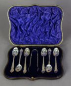 BOXED SET OF 6 SILVER TEASPOONS AND MATCHING BOWS, in attractive serpentine front, blue plush