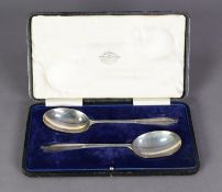 CASED PAIR of EARLY 20th CENTURY SILVER FRUIT SERVING SPOONS, London 1912, 4 oz