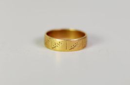 GOLD COLOURED METAL RING, (marked 18ct), engraved with foliate sprigs, 5.2gms, ring size Q