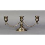 WEIGHTED SILVER TWIN BRANCH THREE LIGHT LOW CANDELABRUM, with scroll arms, urn shaped sconces and