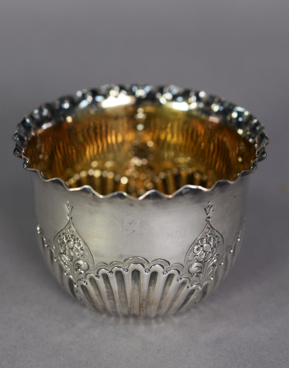 LATE VICTORIAN CASED SILVER SUGAR BOWL with gilded interior, originally with a spoon (now absent),