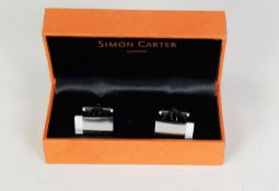 SIMON CARTER, LONDON, BRIGHT METAL T BAR CUFFLINKS, the oblong tops each with an inset mother of