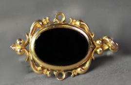 GOLD COLOUR METAL (unmarked) BLACK ONYX SET PENDANT LOCKET, 11.6 gms gross