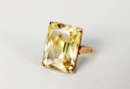 9ct GOLD DRESS RING with large oblong citrine in a four claw setting, (2 x 1.5cm), 8.8gms gross,