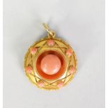 VICTORIAN GOLD COLOUR METAL (no carat mark) CORAL SET CIRCULAR PENDANT LOCKET with vacant locket