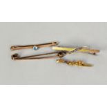 9ct GOLD BAR BROOCH, collet set with centre small pale blue stone; 9ct GOLD BAR BROOCH with overlaid