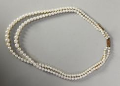 TWO-STRAND NECKLACE OF GRADUATED CULTURED PEARLS with 9ct GOLD CLASP, 16 1/2in (42cm), in associated