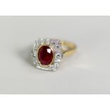 18ct YELLOW and WHITE GOLD RING, the ART DECO STYLE SETTING with a central COLLET set RUBY within