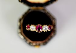 18ct GOLD RING, claw set with two round, old cut diamonds, each approximately .20ct and three