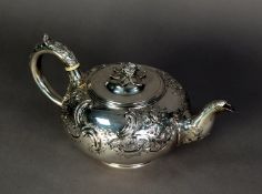 GEORGE IV SILVER TEAPOT BY THE BARNARDS of compressed circular form, the body chased with
