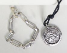 SILVER BRACELET with long links and trigger catch and a CORD NECKLACE with silver disc medallion