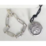 SILVER BRACELET with long links and trigger catch and a CORD NECKLACE with silver disc medallion