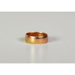 CONTINENTAL GOLD COLOURED METAL BROAD WEDDING RING, inscribed and dated 1918, 3.5gms, ring size M/N