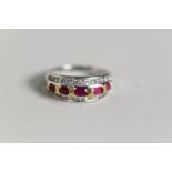 18ct WHITE and YELLOW GOLD HALF HOOP RING set with FIVE SMALL GRADUATED RUBIES between borders of