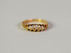 EDWARDIAN 18ct GOLD RING, with lozenge shaped top set with five tiny diamonds, Chester 1902, ring
