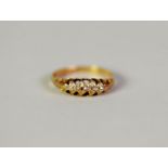 EDWARDIAN 18ct GOLD RING, with lozenge shaped top set with five tiny diamonds, Chester 1902, ring