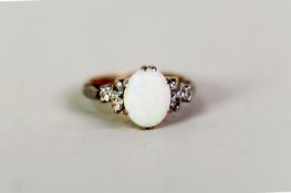SMALL 18th CENTURY OVAL OPAL AND DIAMOND SET RING, the opal flanked by 6 small diamonds in tri-
