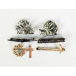 SILVER AND MARCASITE OPEN WORK OBLONG BAR BROOCH; a small gold coloured metal CROSS PENDANT set with