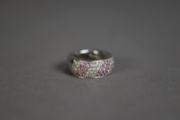 18ct WHITE GOLD, DIAMOND & PINK SAPPHIRE HALF HOOP RING, the top set with five rows of tiny