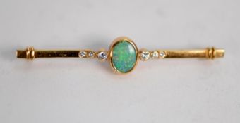 18ct BAR BROOCH, collet set with a centre oval opal with three collet stepped and graduated diamonds