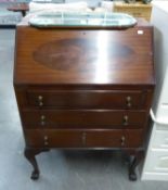A SMALL MAHOGANY BUREAU, HAVING THREE DRAWERS BELOW THE FALL FRONT, RAISED ON CLAW AND BALL SHORT