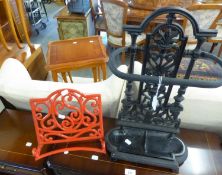 A GOOD QUALITY CAST IRON STICK STAND AND A CAST RED PAINTED MUSIC STAND (2)