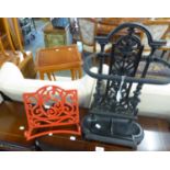 A GOOD QUALITY CAST IRON STICK STAND AND A CAST RED PAINTED MUSIC STAND (2)