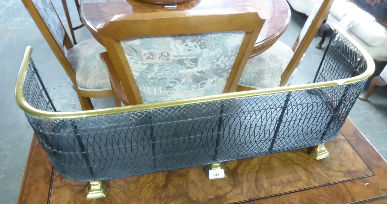 VICTORIAN FENDER OF FANCY TRELLIS PATTERN, WITH BRASS TOP RAIL, THE LOWER FRAME WITH LOBED FRIEZE