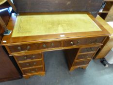 GEORGIAN STYLE MAHOGANY AND YEW-WOOD VENEERED DOUBLE PEDESTAL DESK, WITH TOOLED LEATHER INSET TOP,