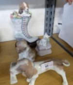 FOUR LLADRO GROUPS OR MODELS OF DOGS, comprising: ‘A WELL HEALED PUPPY’, modelled as a puppy and