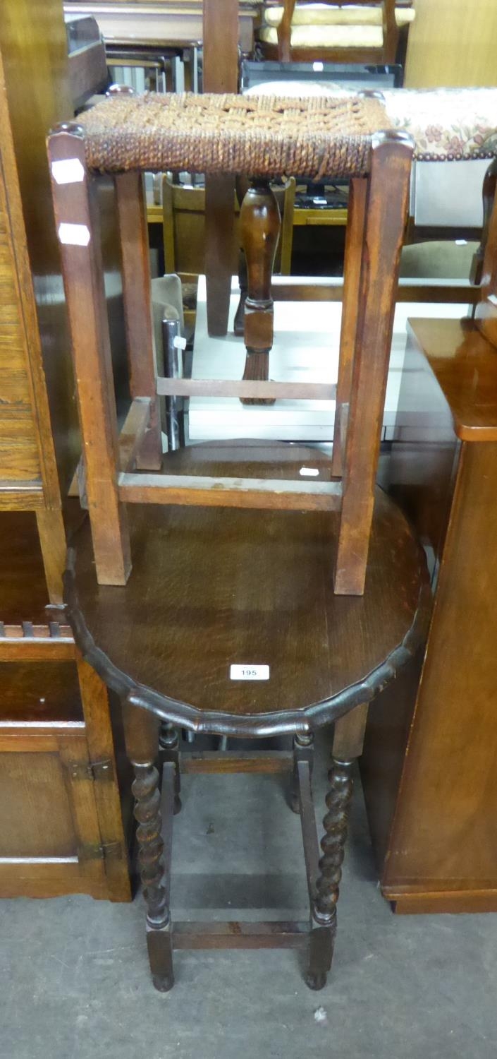 CIRCA 1920S OAK OVAL OCCASIONAL TABLE, WITH WAVY EDGE AND SPIRAL LEGS AND A STRING WORK SQUARE STOOL