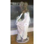 LLADRO ‘SOCIALITE OF THE 20’s’ PORCELAIN FIGURE, modelled as a well-dressed lady with feathered