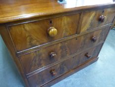 VICTORIAN FLAME FIGURED MAHOGANY SMALL CHEST OF TWO SHORT AND TWO LONG DRAWERS, WITH COCK-BEADED